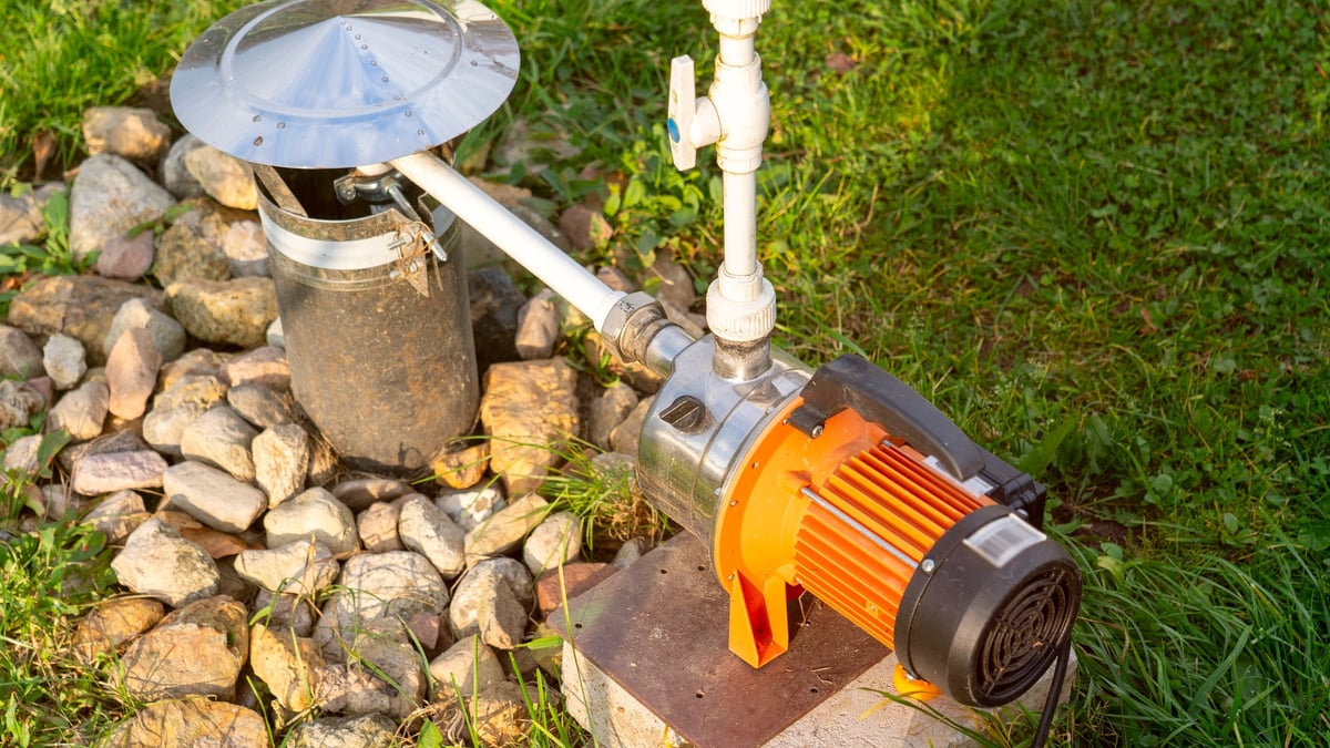 Water pump extracting groundwater from well